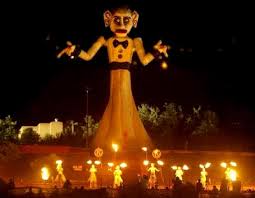 Zozobra about to be set on fire at night