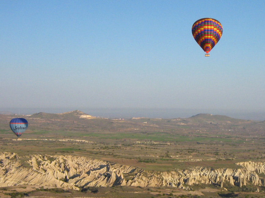 hot air balloon rides approaching landing.
