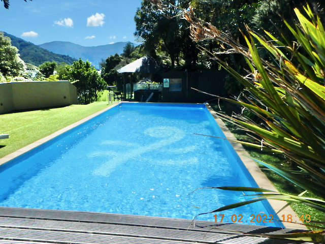 The open air swimming pool at Punga Cove Resort