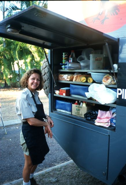 Woman standing next to an RV in Kakadu National Park, Australia