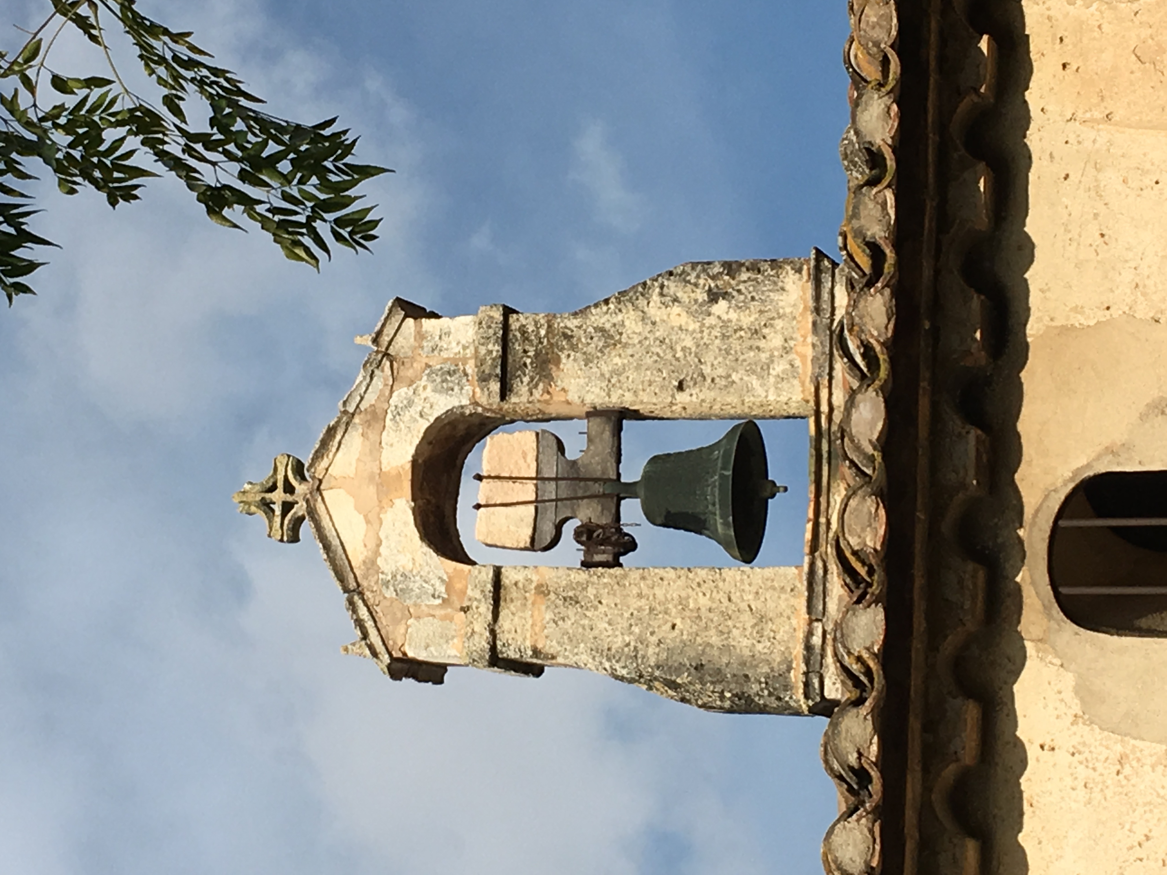 A church bell and steeple
