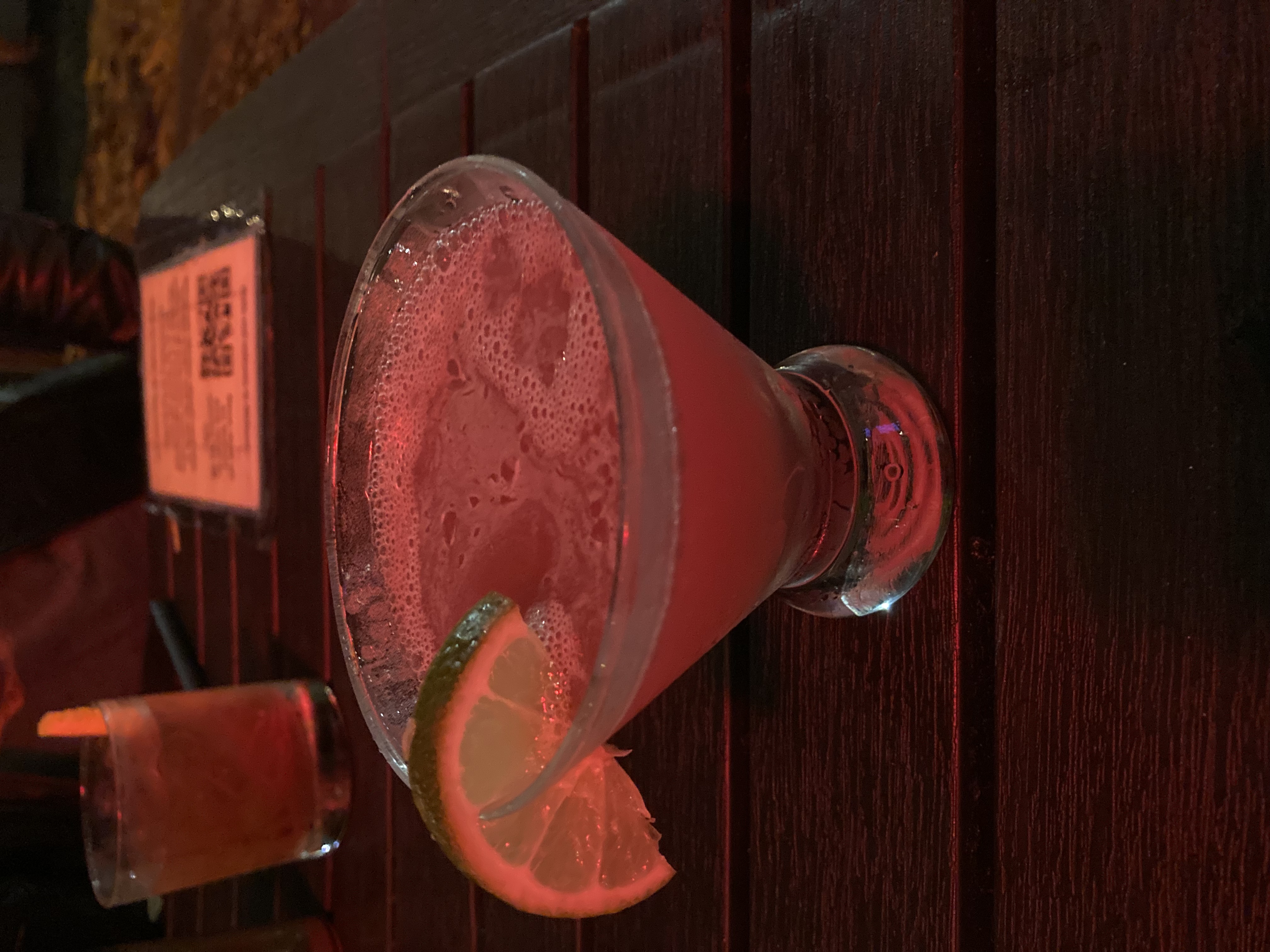 A pink cosmopolitan cocktail