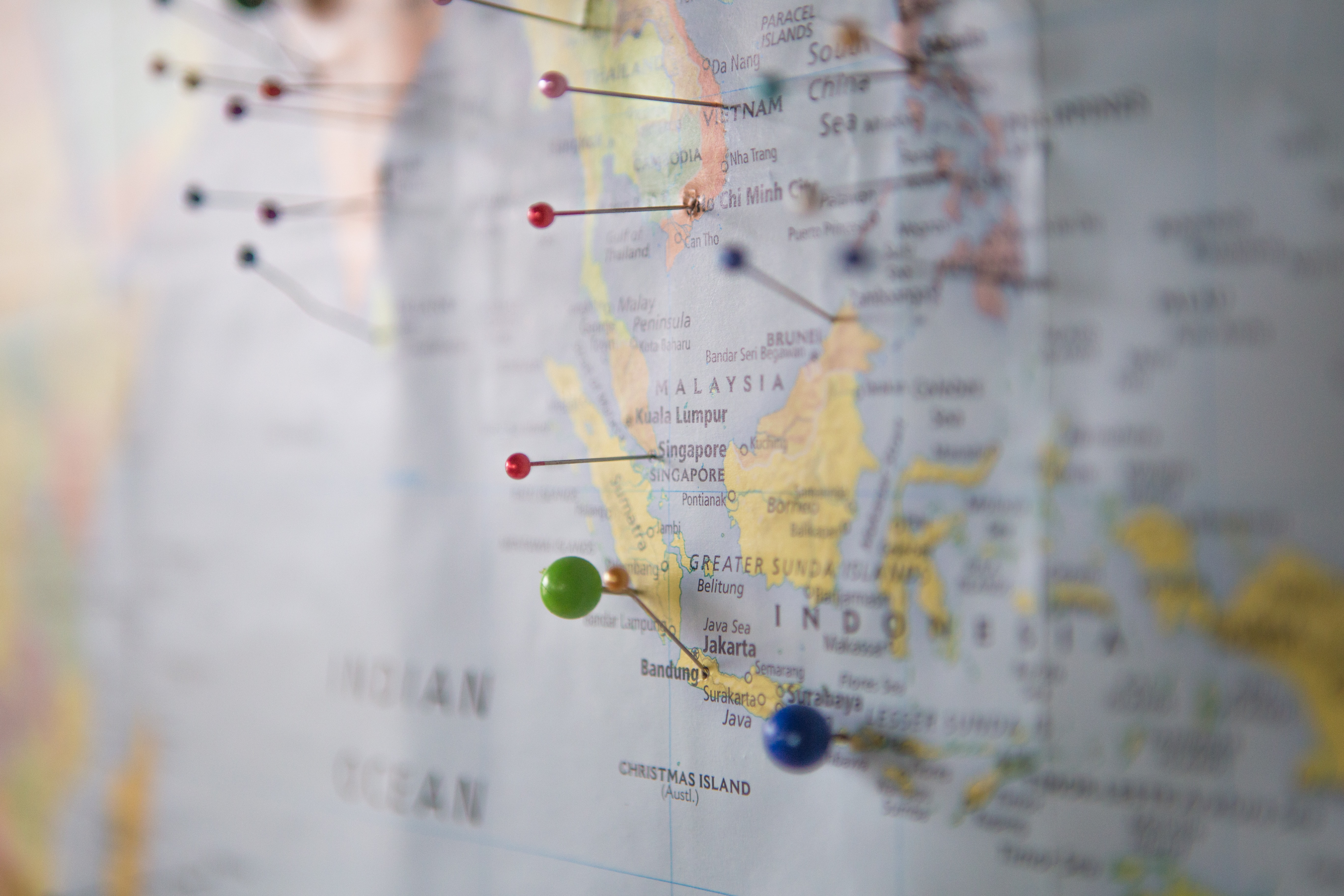 A map with colored pins marking an overseas trip