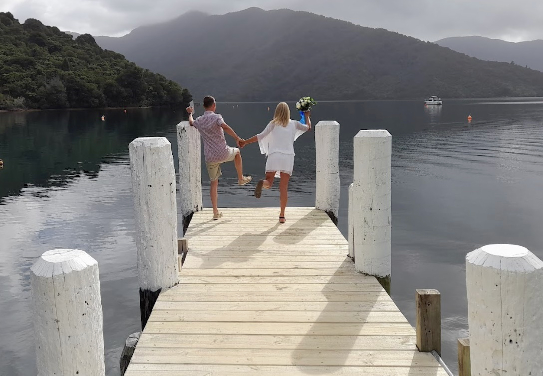 Richard and Mogsy getting ready to jump off Camp Bay Jetty at Punga Cove in the Marlborough Sounds