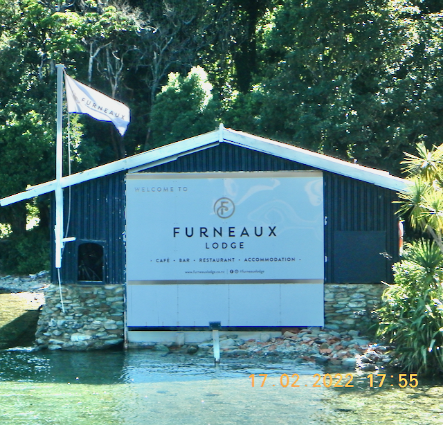 A big board at the jetty of Furneaux Lodge, the the Marlborough Sounds New Zealand