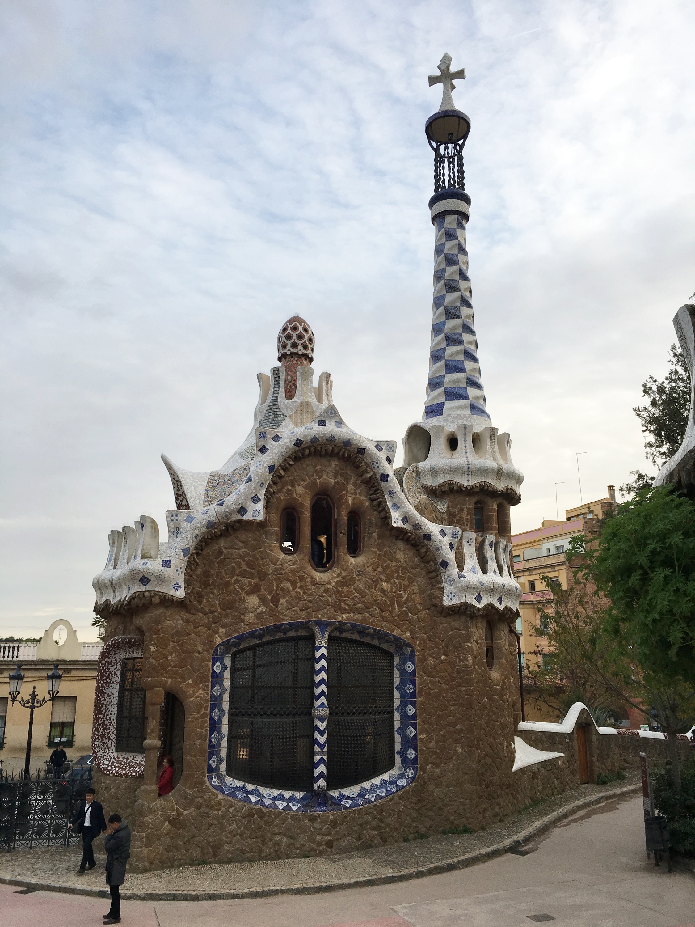 Quirky Gaudí building with a tower