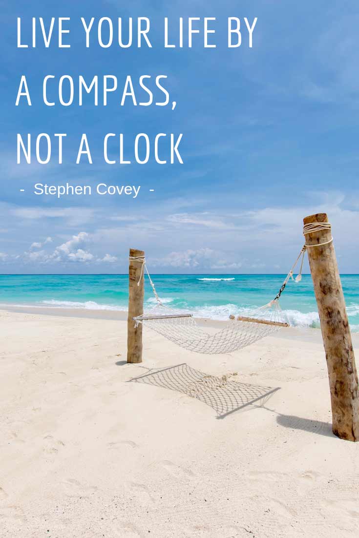 live life by a compass not a clock quote - hammock on the beach