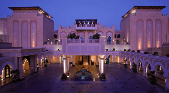 Pink spa building at sunset in Abu Dhabi