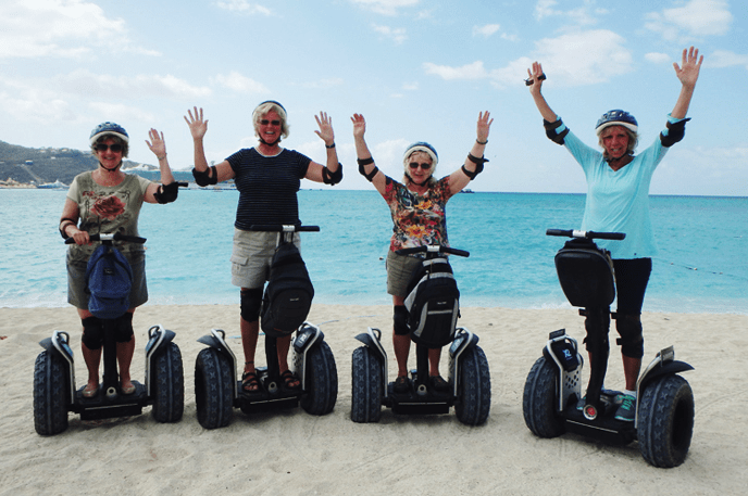 Adventuress ladies on a beach Segway tour