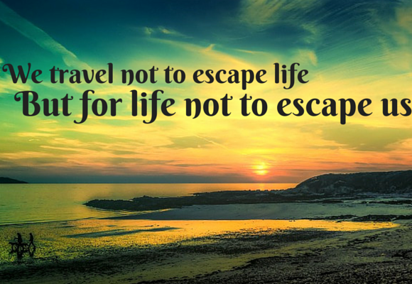 travel not to escape life quote - sunset coastal scene